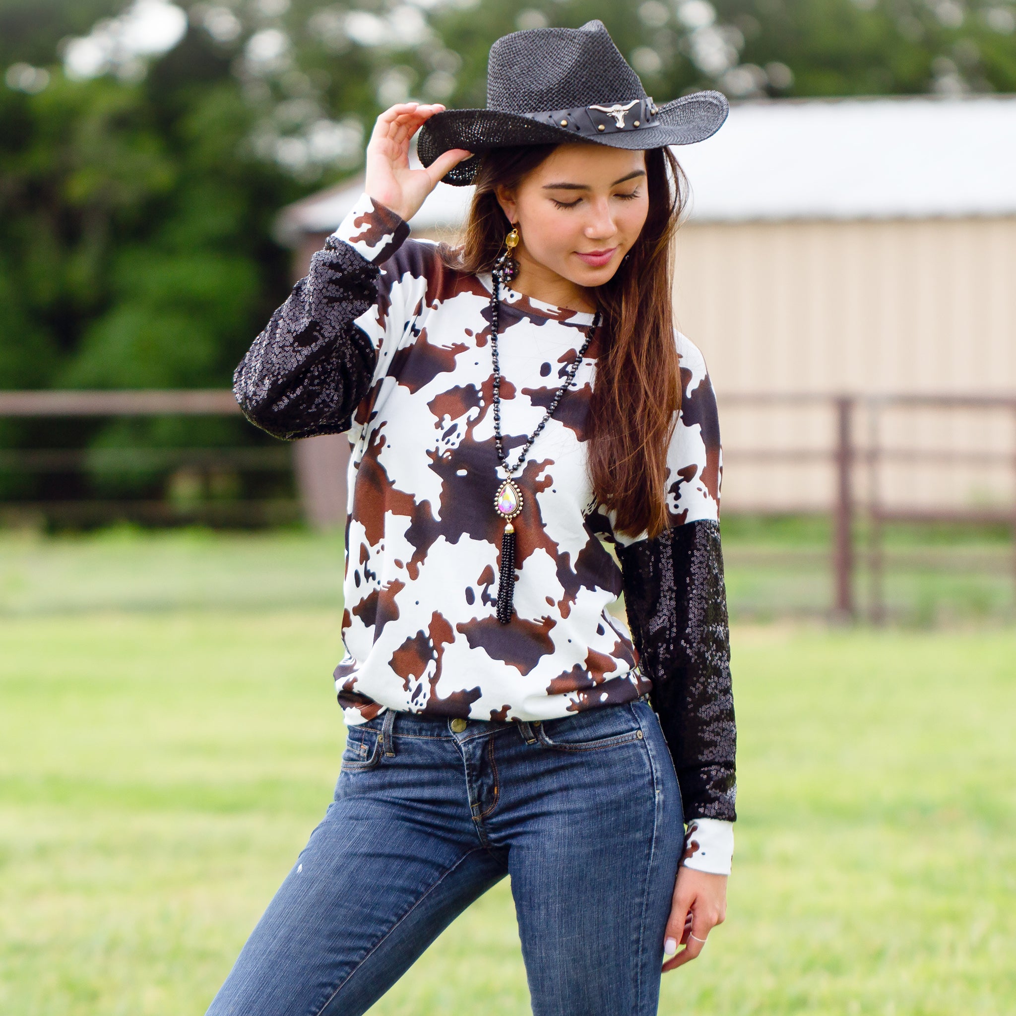 10667 - Cow Print Top with Sequin Sleeves | Your Fashion