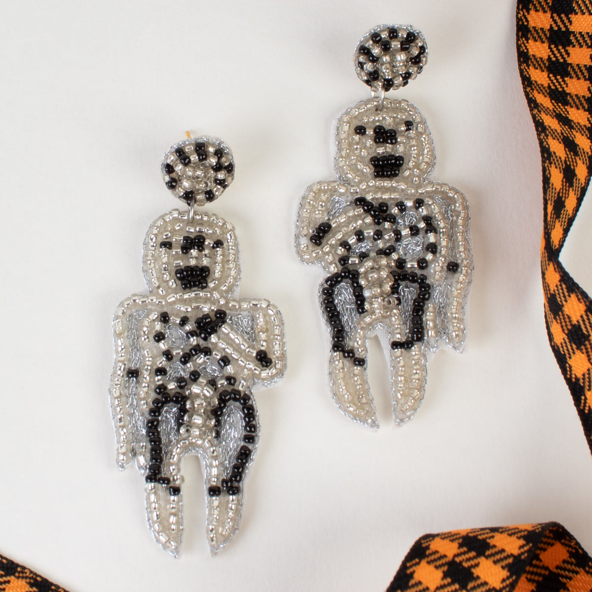 1551 - Beaded Skeleton Earrings - White