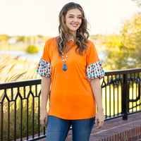 Load image into Gallery viewer, 30012 - Orange Top with Geometric Balloon Sleeves
