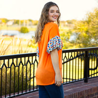 Load image into Gallery viewer, 30012 - Orange Top with Geometric Balloon Sleeves
