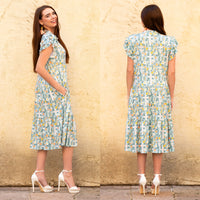 Load image into Gallery viewer, 50055 - Ruffle Sleeve Floral and Cross Dress with Pockets

