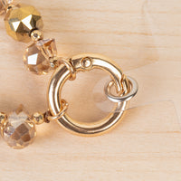 Load image into Gallery viewer, 70971 - Beaded Bow Phone Wristlet - Gold
