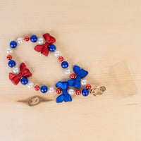 Load image into Gallery viewer, 70972 - USA Beaded Bow Phone Wristlet - Red White &amp; Blue
