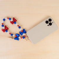 Load image into Gallery viewer, 70972 - USA Beaded Bow Phone Wristlet - Red White &amp; Blue
