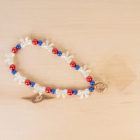 Load image into Gallery viewer, 70974 - USA Beaded Bow Phone Wristlet - Red White &amp; Blue
