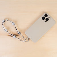 Load image into Gallery viewer, 70980 - Beaded Soccer Phone Wristlet - Black &amp; White
