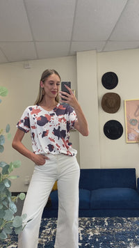 Load and play video in Gallery viewer, 30075 - Cow Print Half Sleeve Top

