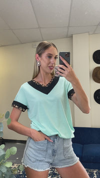 Load and play video in Gallery viewer, 30062 -V-Neck Top with Leopard Accents
