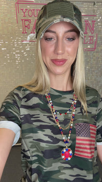 Load and play video in Gallery viewer, 10470 - Half Sleeve Camo Top With American Flag Pocket
